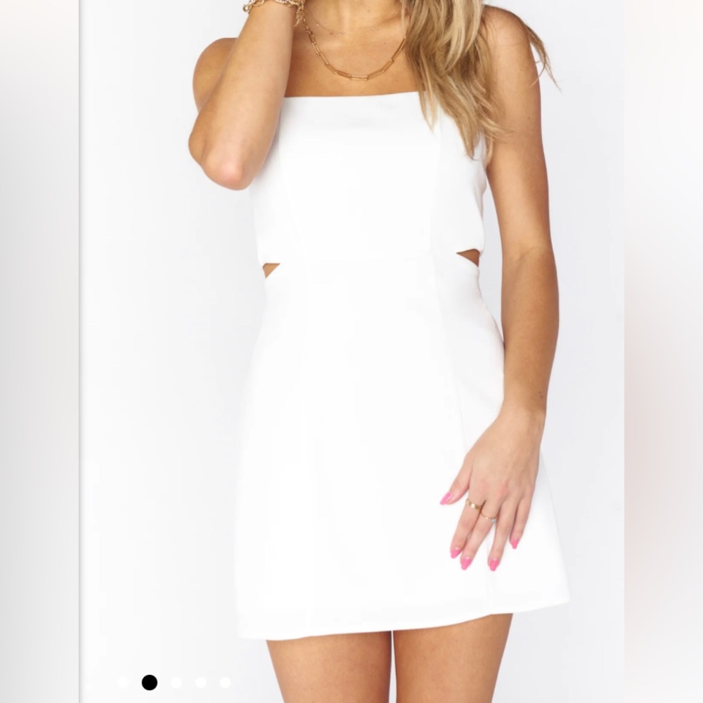 MUMU cutout mini dress. Adjustable straps and zipper closure.
